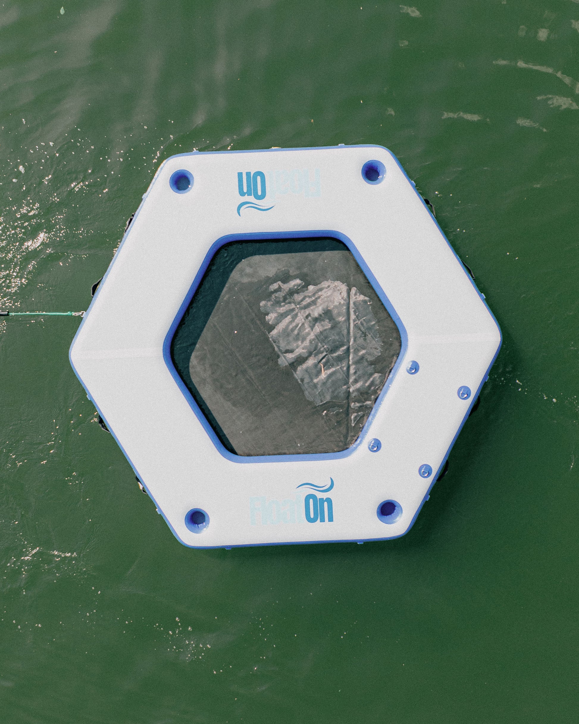 The 9ft Oasis water mat floating on the lake.