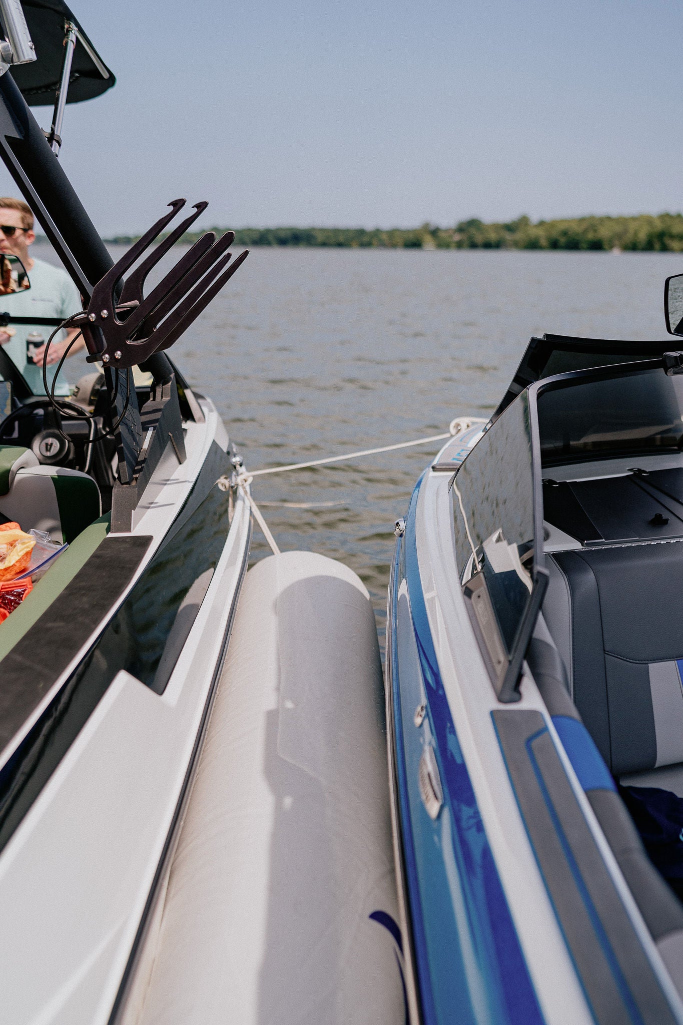 The Tide Guard Inflatable Boat Fender between two docked boats.