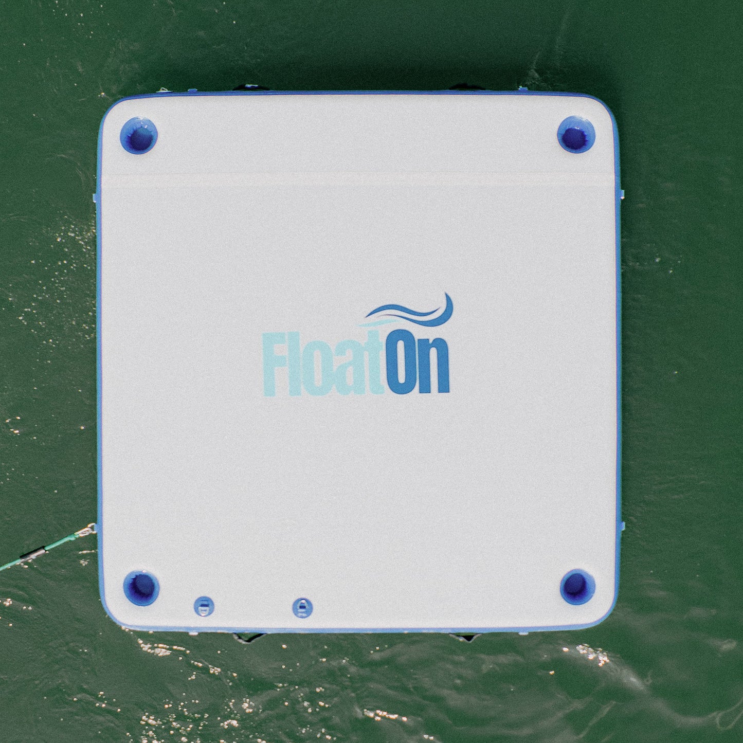 The Low Tide inflatable dock from Float On floating on the lake.